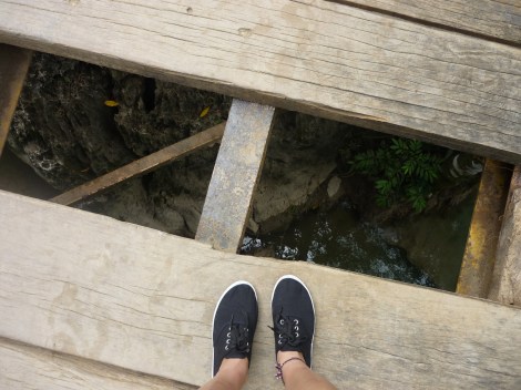 semuc standing on the bridge