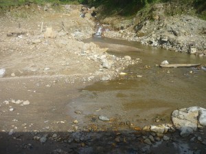 river across the gravel road vilcabamba to zumba